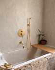 Wall Mounted Tub Filler with Hand Shower – Unlacquered Brass