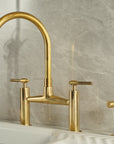 Vintara Unlacquered Brass Bridge Kitchen Faucet with Side Sprayer