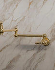 Articulated brass pot filler faucet in two handle styles, old lever or simple cross