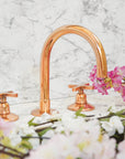 Copper finish deck-mounted brass bathroom faucet with gooseneck spout