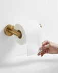 Unlacquered Brass Toilet Paper Holder Mounted on Wall with Hand Pulling Tissue