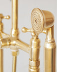 Freestanding tub filler, solid brass construction