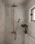 Unlacquered brass shower for indoor and outdoor use