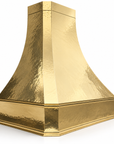 Classic brass vent hood cover with warm antique tone
