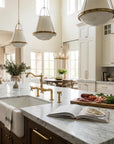 Farmhouse Bridge faucet in solid unlacquered brass