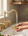 The Farmhouse Bridge unlacquered brass kitchen faucet