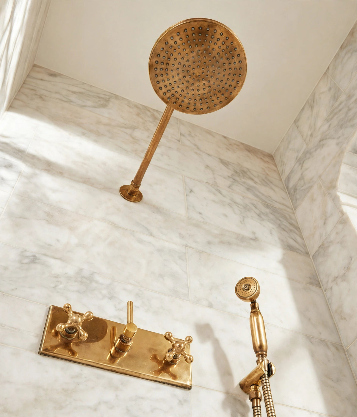 Unlacquered brass Oasis shower set that ages to a natural patina