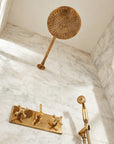 Unlacquered brass Oasis shower set that ages to a natural patina