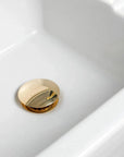 Brasslik push up sink drain without overflow in solid unlacquered brass