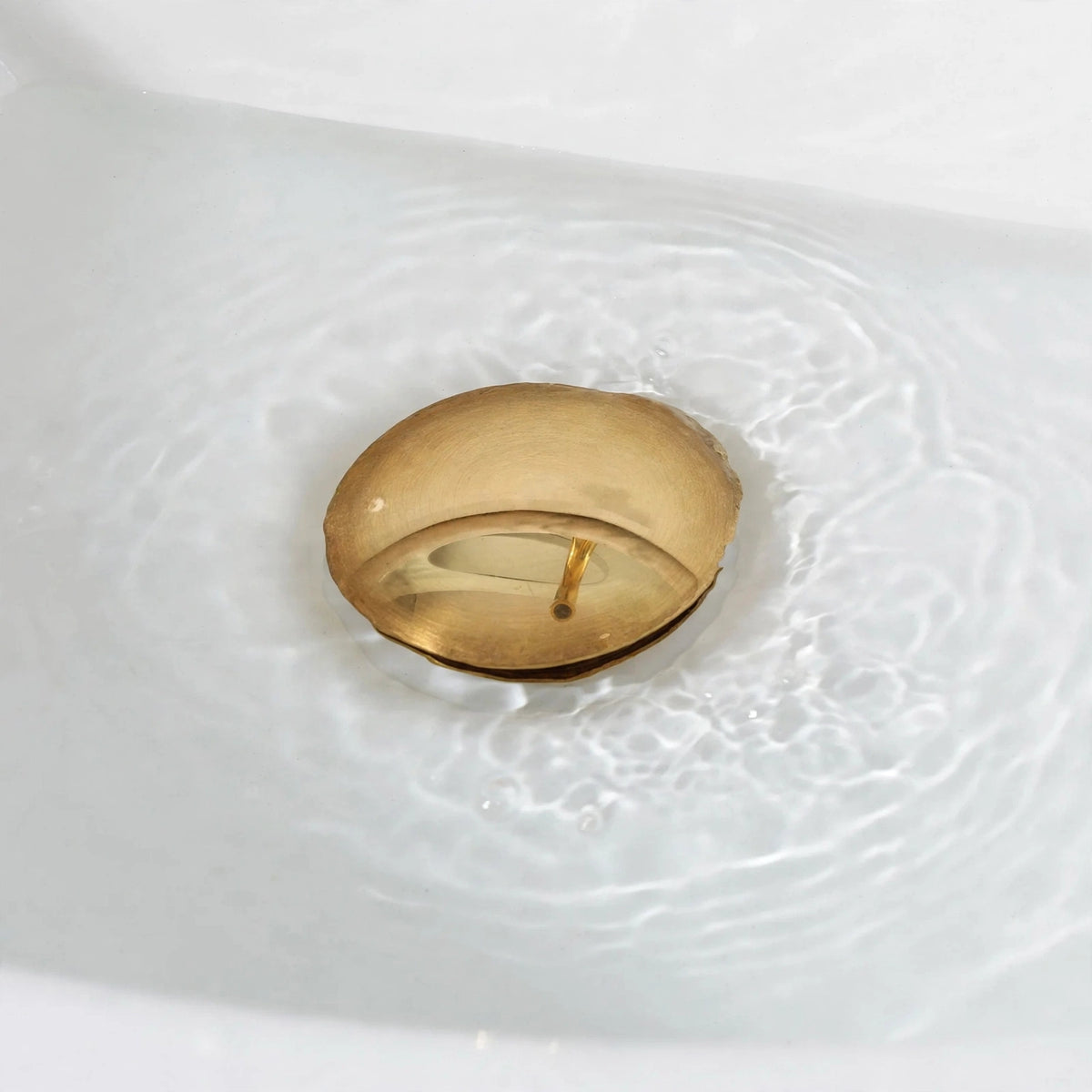 Push up sink drain without overflow, unlacquered brass