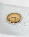 Push up sink drain without overflow, unlacquered brass