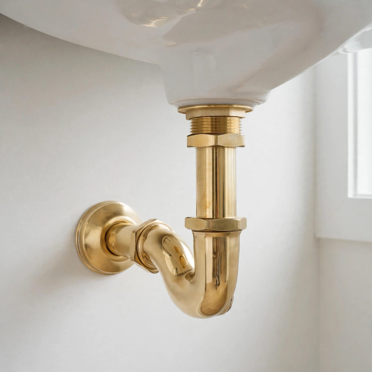 Unlacquered brass push up sink drain without overflow that ages to a natural patina
