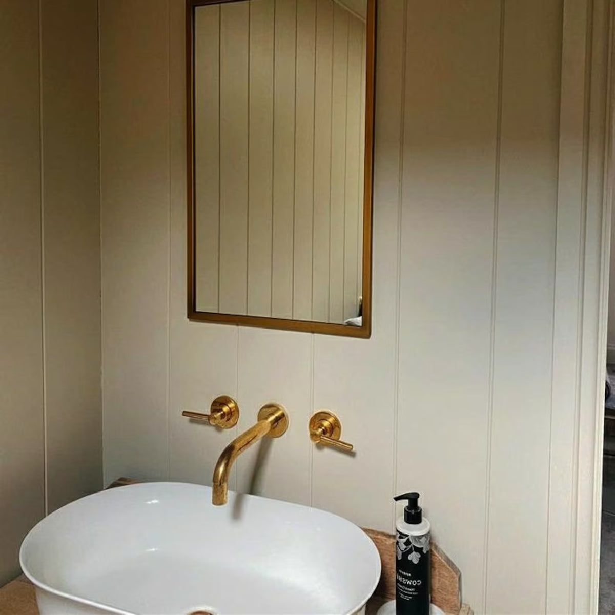 Solid unlacquered brass wall-mounted bathroom faucet, Al Ula by Brasslik