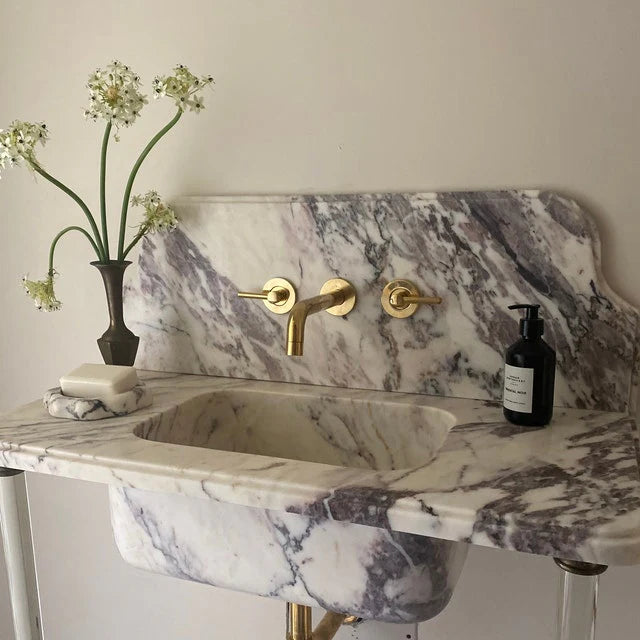 Unlacquered brass wall-mounted faucet handcrafted by Brasslik