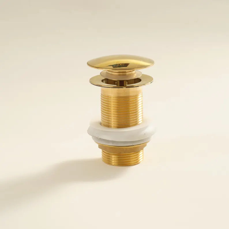 Brass bathroom pop up drain