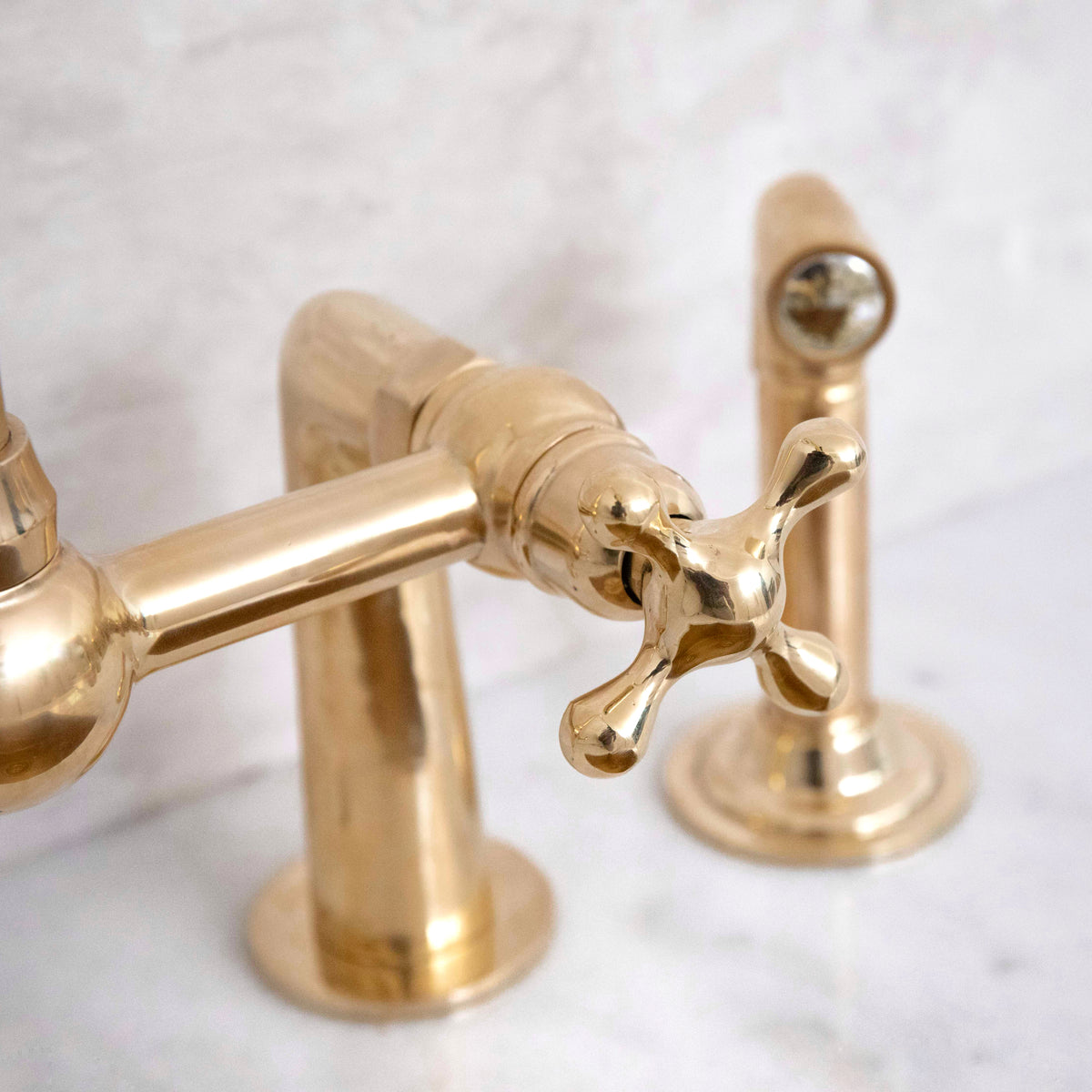 Traditional solid brass bridge kitchen faucet with high-arc design