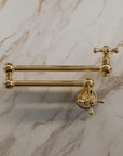 Articulating wall-mounted pot filler faucet in solid brass