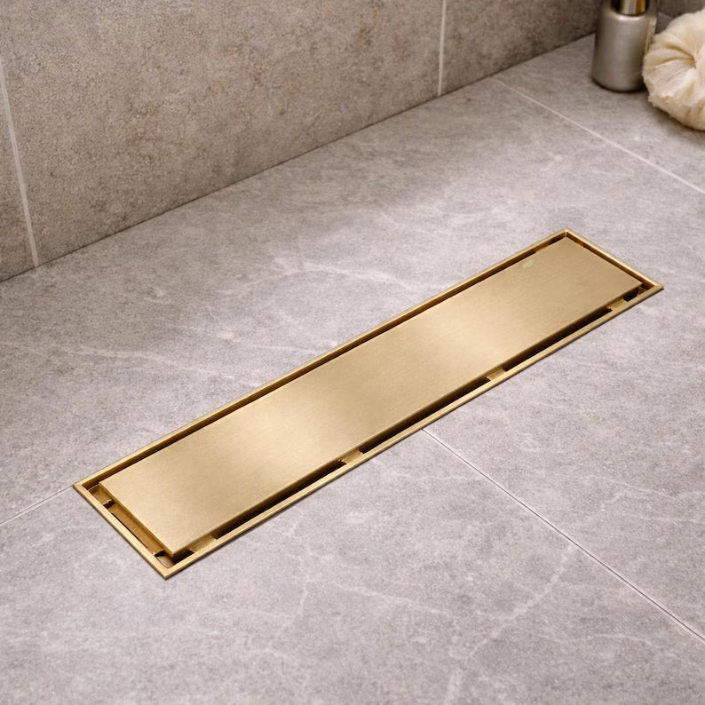 Casada unlacquered brass linear shower drain with tile insert