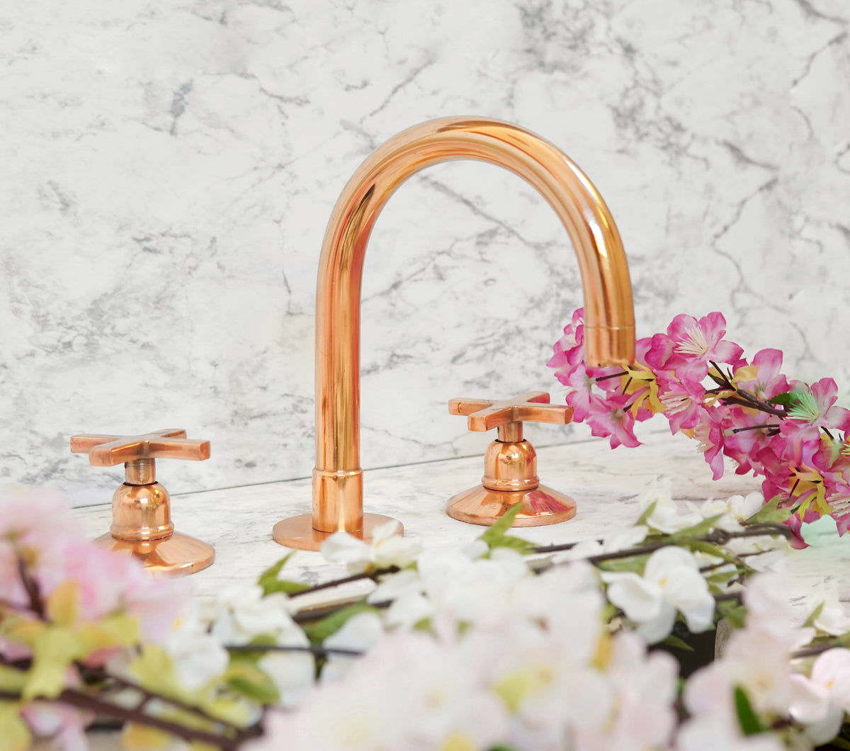 Copper finish deck-mounted brass bathroom faucet with gooseneck spout