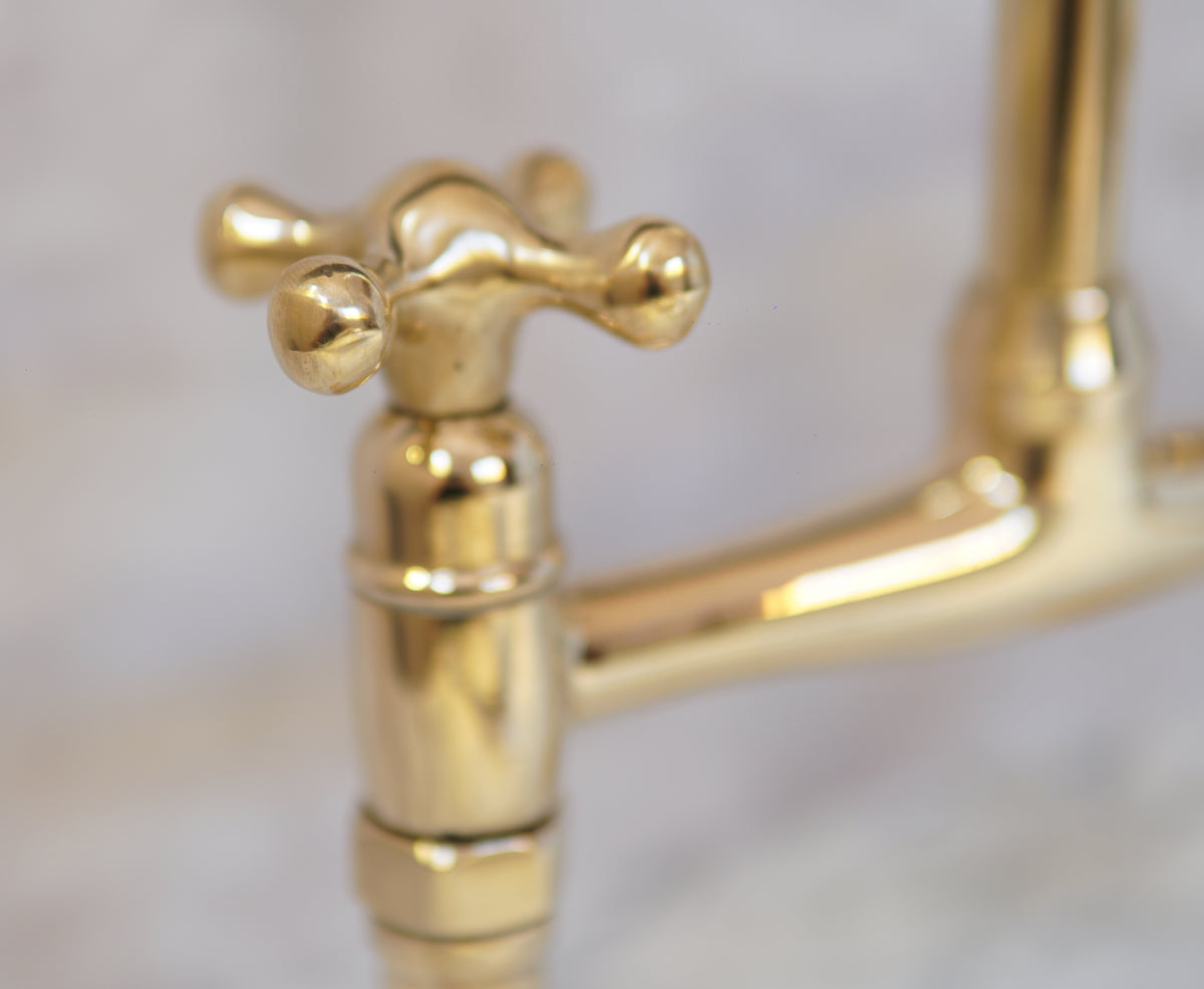 Solid brass bridge faucet with curved legs, with or without sprayer