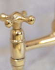 Solid brass bridge faucet with curved legs, with or without sprayer