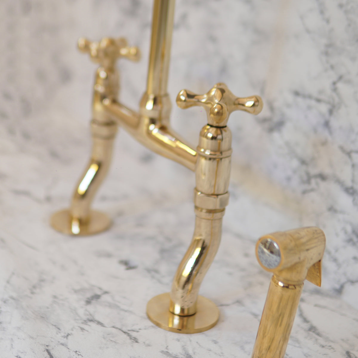 Curved leg brass bridge kitchen faucet with traditional design