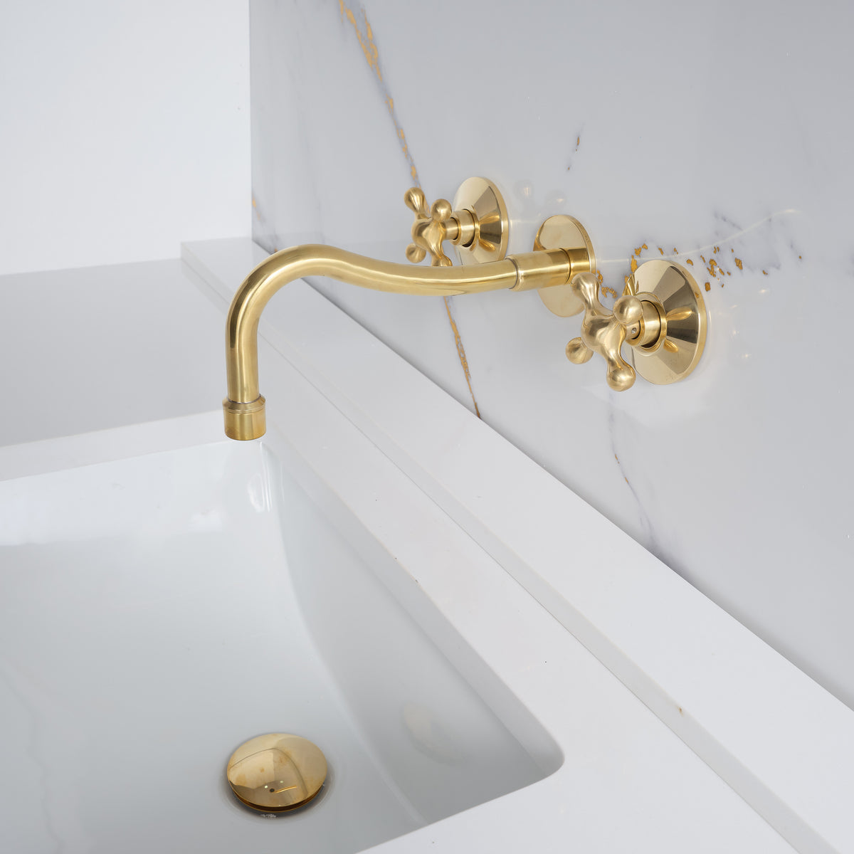 Handcrafted curved spout wall mount faucet in solid brass