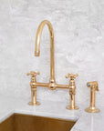 Dusty brass bridge faucet with side sprayer option