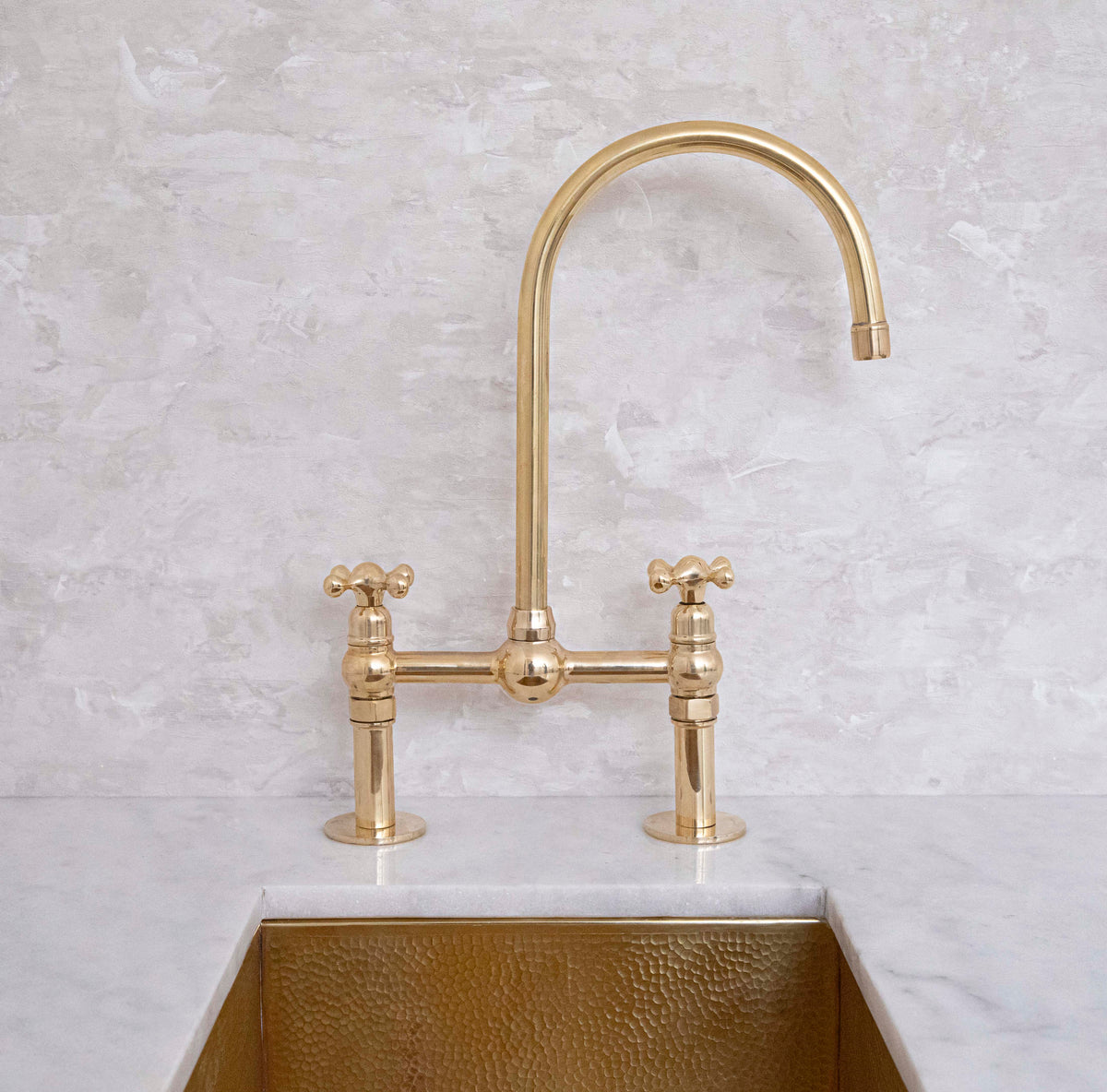 Dusty unlacquered brass bridge faucet with optional cold water tap
