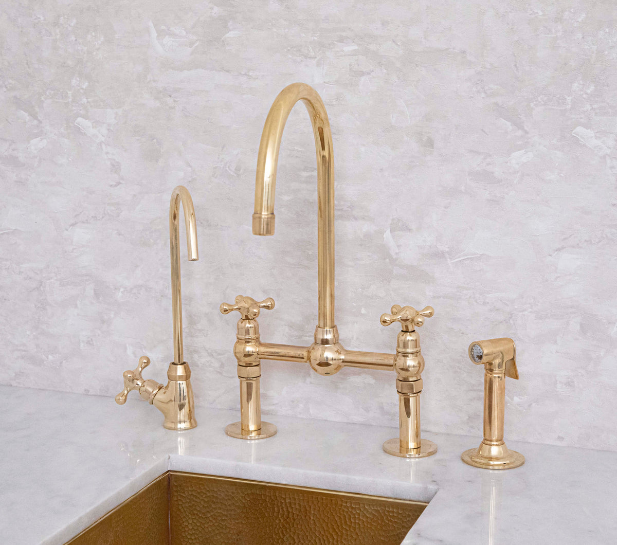 Traditional Dusty unlacquered brass bridge faucet for kitchens
