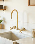 Handcrafted Ramsey wall mounted brass faucet