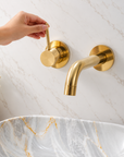 Roswell single handle wall mount tap in unlacquered brass