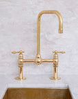 Seven bridge faucet in unlacquered brass by Brasslik