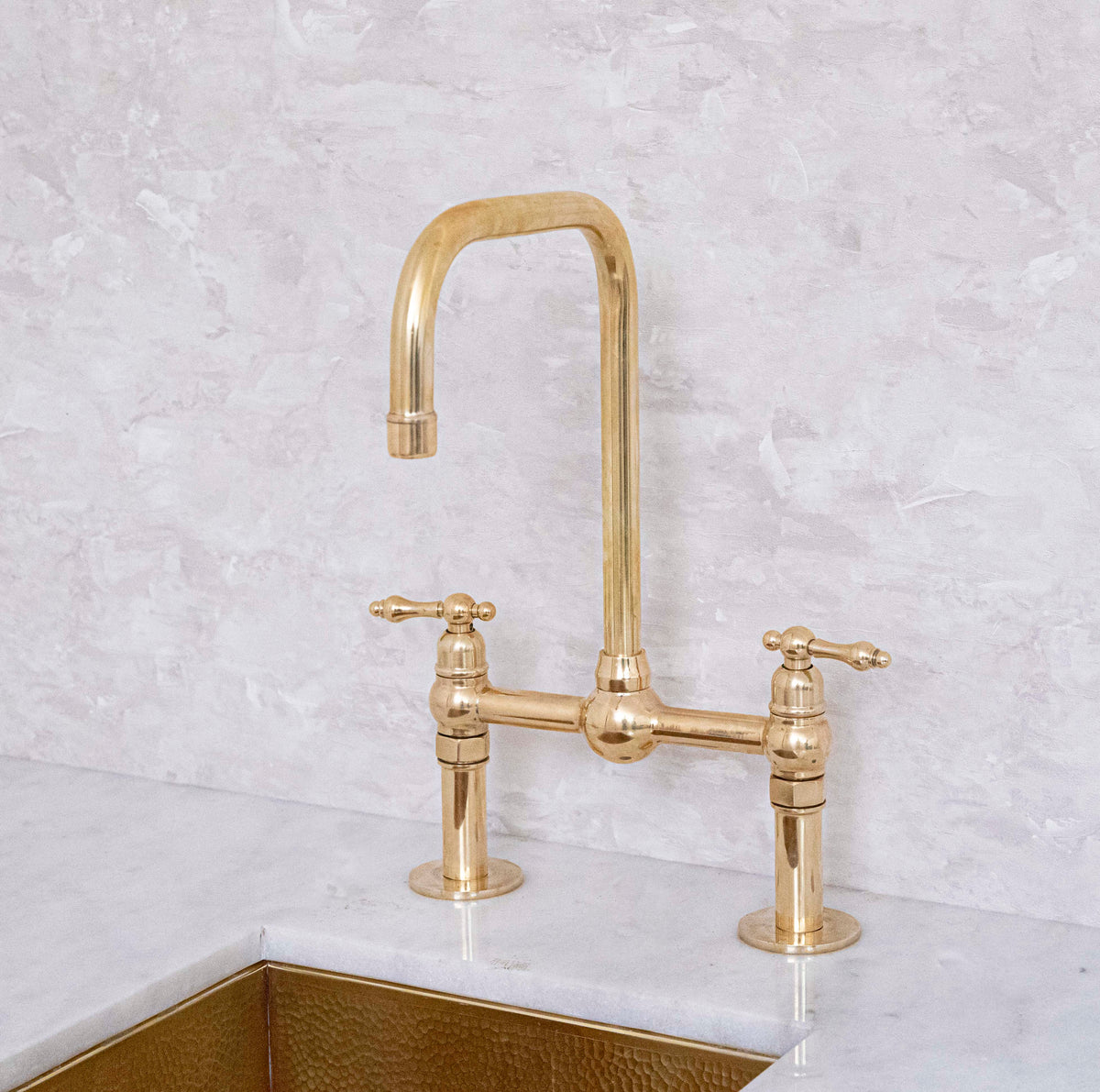 Seven unlacquered brass bridge faucet for kitchen sinks