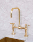 Seven unlacquered brass bridge faucet for kitchen sinks