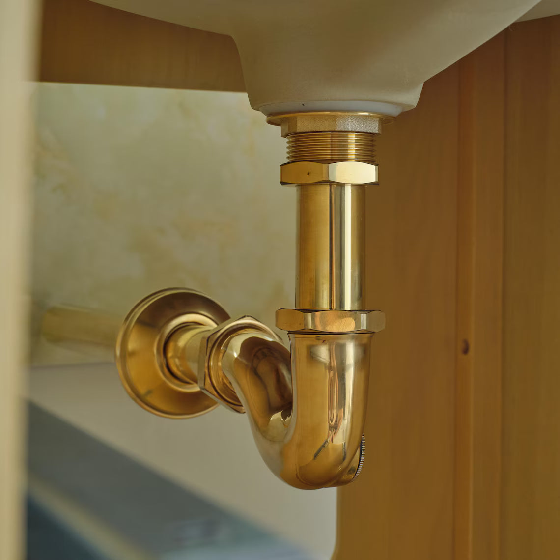 Handcrafted unlacquered brass water trap