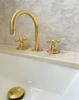 Unlacquered brass deck mount faucet, 3-hole design by Brasslik