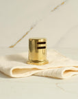 Unlacquered brass sink air gap cover that develops a patina