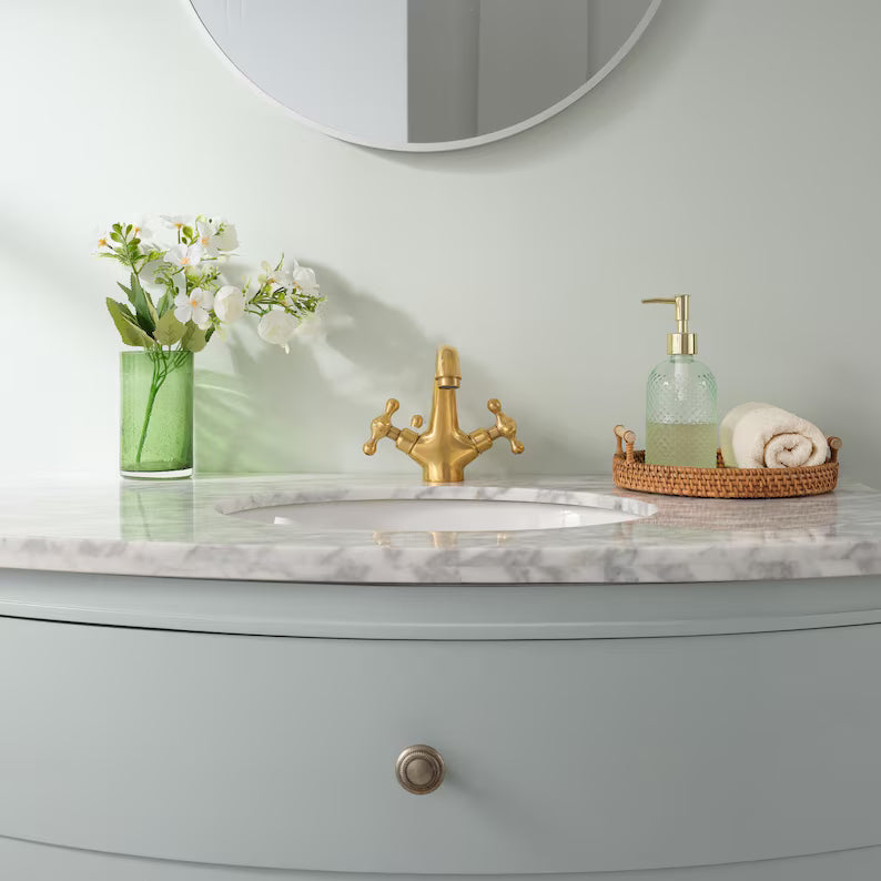 Solid brass bath vanity faucet that develops a natural patina