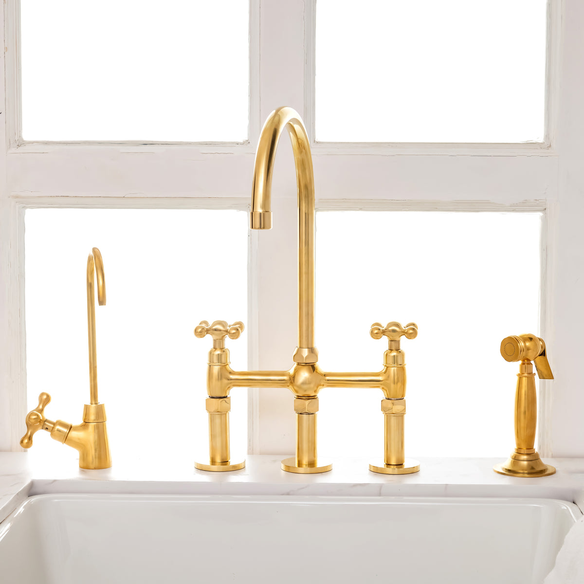 Unlacquered brass 3-leg bridge kitchen faucet with side sprayer