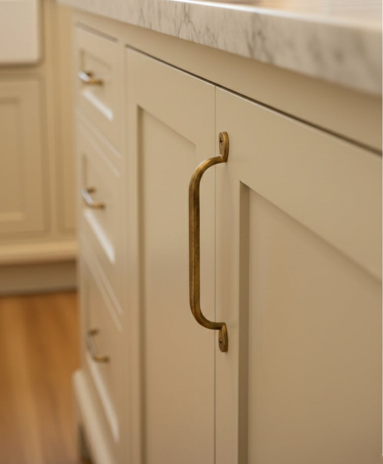 Unlacquered brass cabinet pulls