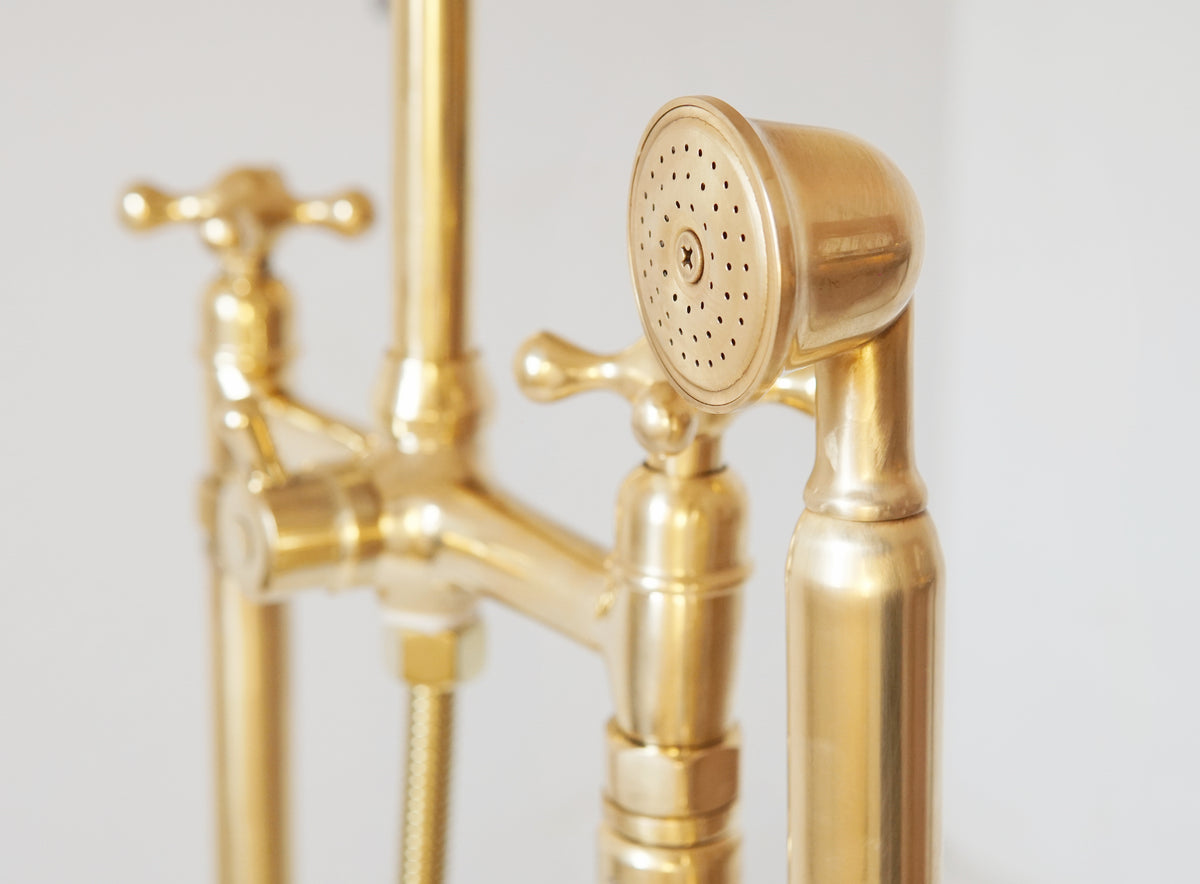 Freestanding tub filler, solid brass construction