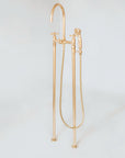 Handmade freestanding brass tub filler