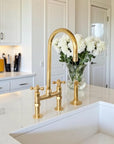 Unlacquered brass kitchen bridge faucet with 6 inch core