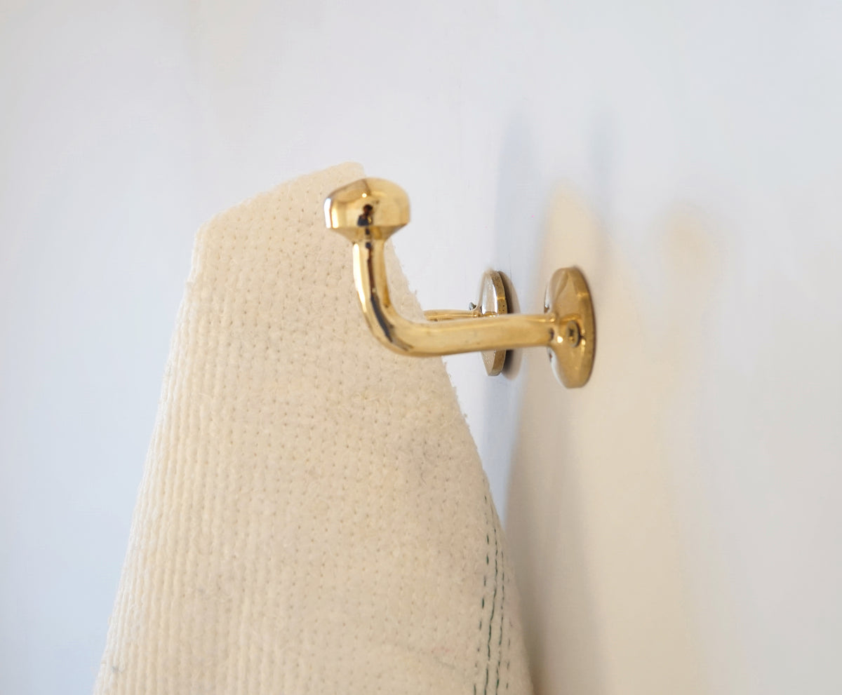 Brass hook for coats, towels and bags