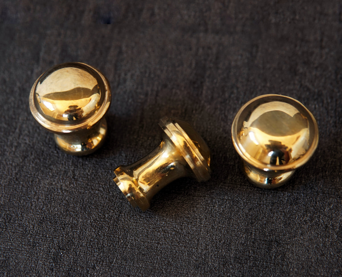 Vintage brass cabinet knob in antique finish