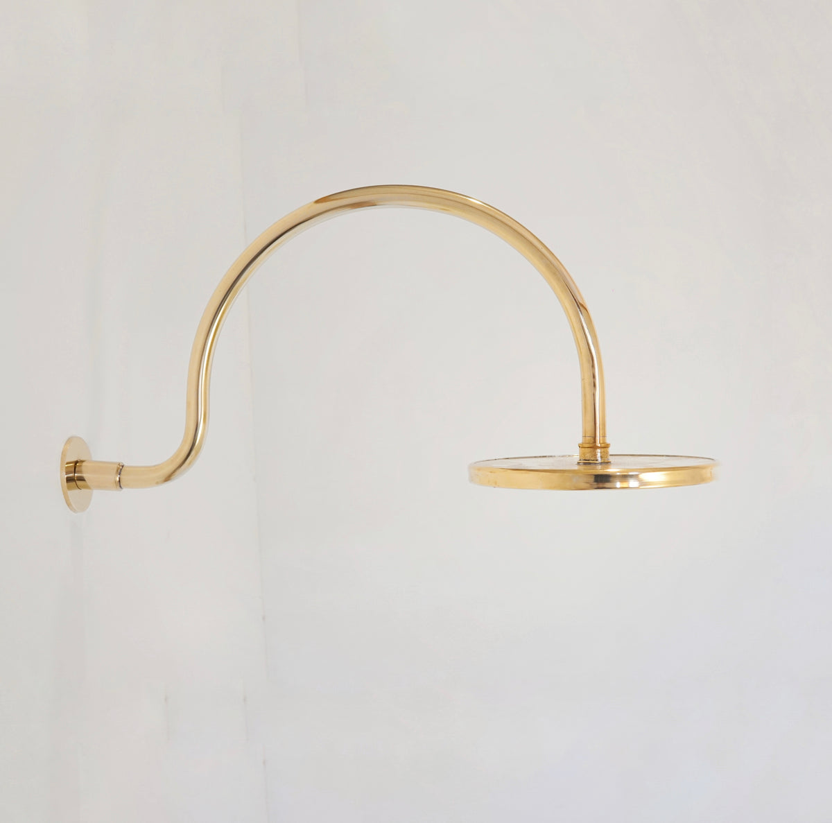 Unlacquered brass shower, high pressure curved arm