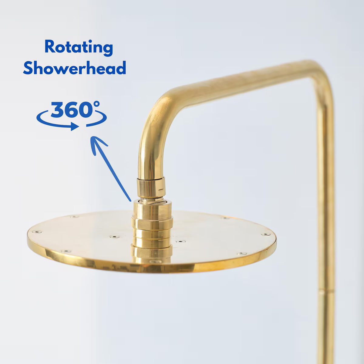 Unlacquered brass outdoor shower that develops a natural patina