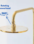Unlacquered brass outdoor shower that develops a natural patina