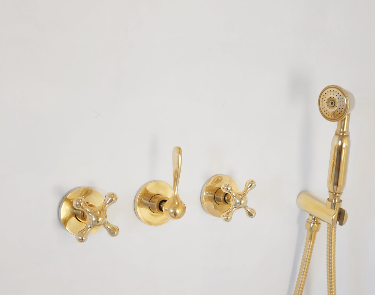 Santorini style curved arm shower in natural unlacquered brass